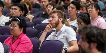 Students listening in a group