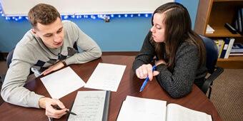 Students with notebooks