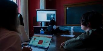 Students watching a class presentation